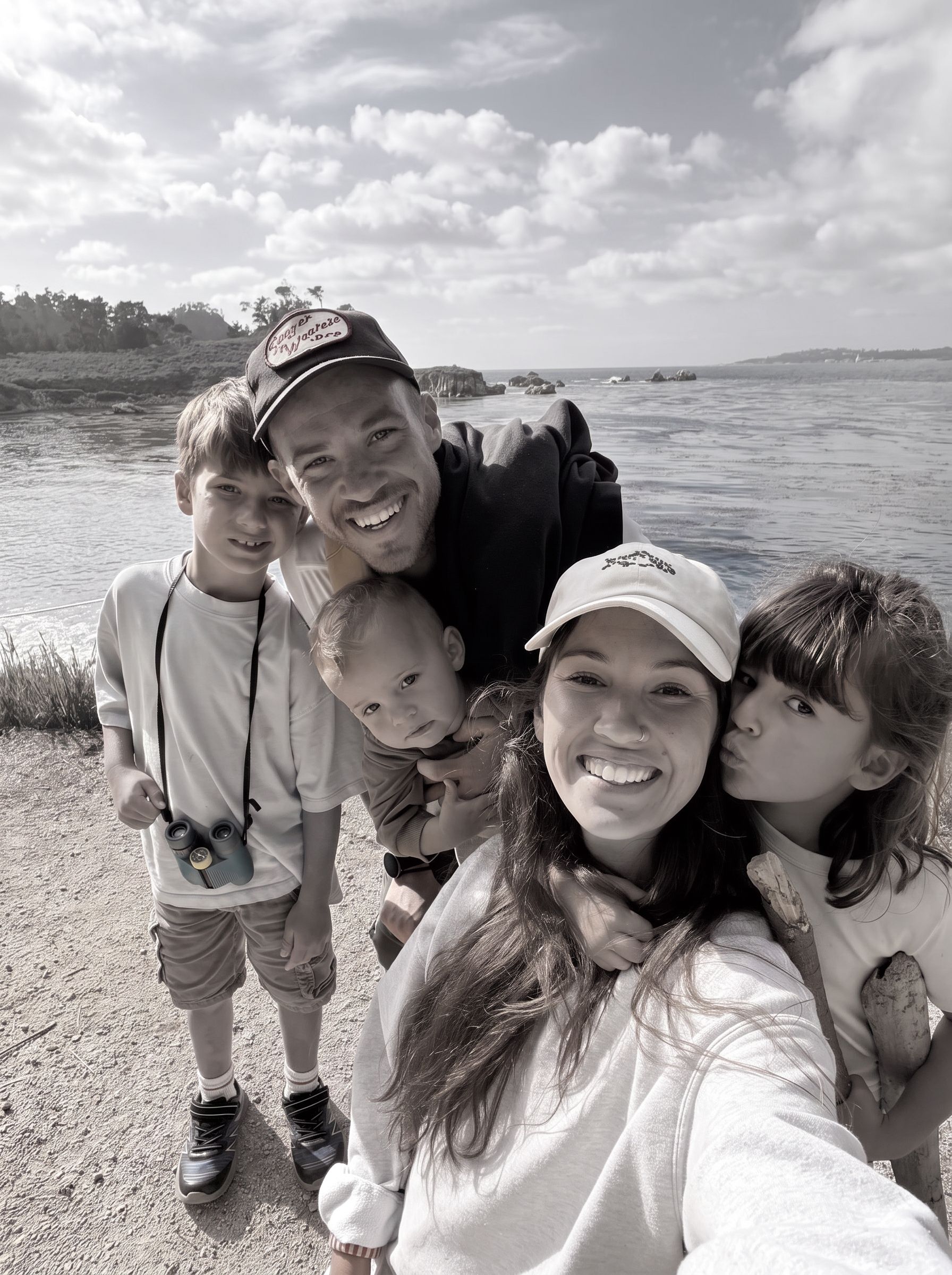 Michael Murphy with his family beside the water